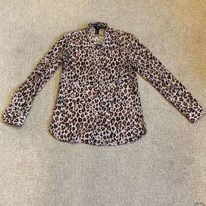 Animal print blouse.